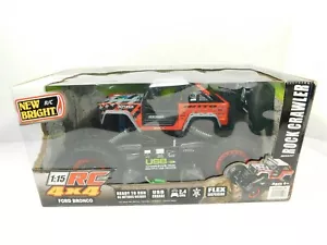 New Bright RC 1:15 Radio Control Ford Bronco Orange Off-Road Truck Rock Crawler - Picture 1 of 9