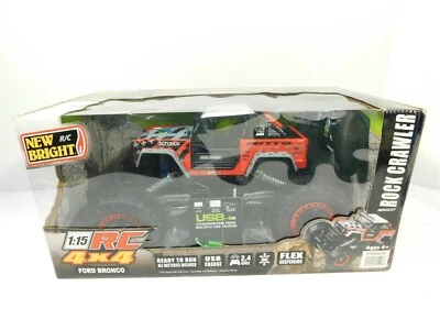 New Bright RC 1:15 Radio Control Ford Bronco Orange Off-Road Truck Rock Crawler - Image 1 of 4