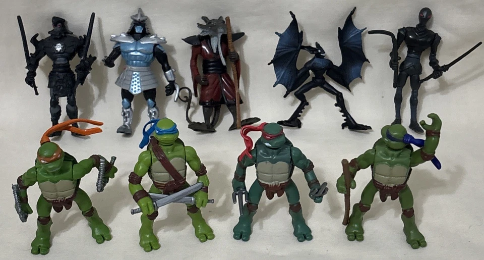 TMNT Teenage Mutant Ninja Turtles - Lote de 9 - Mini figuras de acción de 2" 2006 Foto 1 de 4
