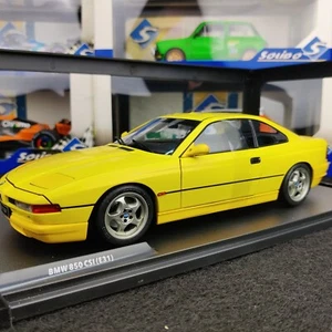 VOITURE SOLIDO BMW 850 CSI E31 DAKAR YELLOW 1990 1:18 NEUF BOITE S1807005 - Imagen 1 de 13
