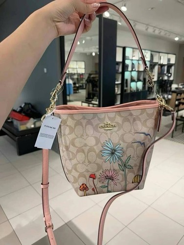 Borsa a secchiello Coach X Observed By Us City nuova con etichette in tela firmata kaki chiaro CU394