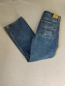 Tommy Hilfiger Mens Jeans 33 Blue Freedom Fit Relaxed Medium Wash Denim Logo - Picture 1 of 14