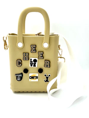 Mini bolso de mano negro y dorado con temática de alegría con correa / bolso Eva con dijes para zapatos Foto 1 de 4