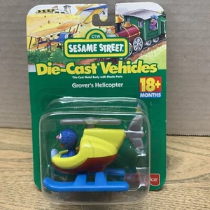 Vintage Sesame Street Grover's Helicopter Fisher Price Die-cast Toy 1999 New - Picture 1 of 4