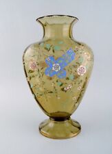 Emile Gallé, France. Large antique vase in smoke colored art glass with flowers.
