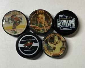 Minnesota Wild Commemorative Pucks - Lot of 5 - 4 are SGA’s - Picture 1 of 7