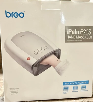 Masajeador de palma eléctrico de mano Breo iPalm520s presión de aire + compresión de calor Foto 1 de 4