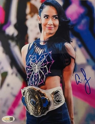 Foto firmada por AJ LEE 8x10 lucha libre autógrafo luchador automático metálico certificado de autenticidad WWE JSA Foto 1 de 4