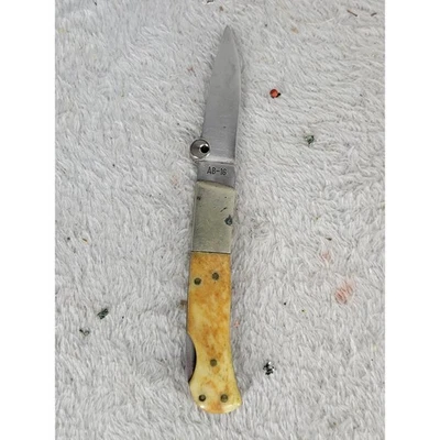 Faca de bolso dobrável American Blade AB 16 cabo ósseo lâmina gravada águia - Imagem 1 de 4