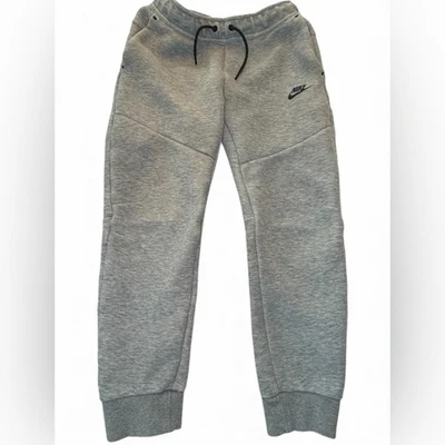 Pantalones de chándal Nike Sportswear Tech polar para niños jóvenes talla grande gris jaspeado Foto 1 de 4