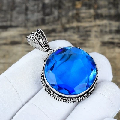 Colgante de joyería étnica de plata de ley 925 hecho a mano con piedras preciosas de topacio azul de Londres Foto 1 de 4
