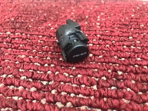 MERCEDES W218 W212 CLS63 E63 AMG CONSOLA CENTRAL AMG BOTÓN INTERRUPTOR OEM - Imagen 1 de 5