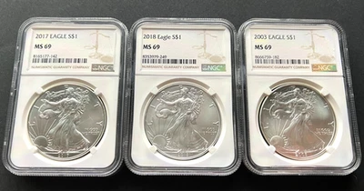 *Lot of (3) ASE 2003, 2017 & 2018. MS69 Graded by NGC on all three coins (NR!) - Image 1 of 2