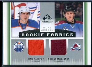 2013-14 SP Game Used Rookie Fabrics Dual #RF2YM Nail Yakupov/Nathan MacKinnon - Picture 1 of 2