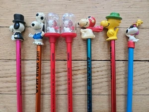 Posten 7 Vintage Peanuts Snoopy Bleistifte mit Topper Kugel Gummi beweglich Woodstock - Bild 1 von 9