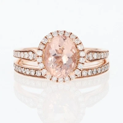 Conjunto de anillos de boda de oro rosa de 14 k con halo de diamantes ovalados de morganita de 1,66 quilates talla 7,25 Foto 1 de 4