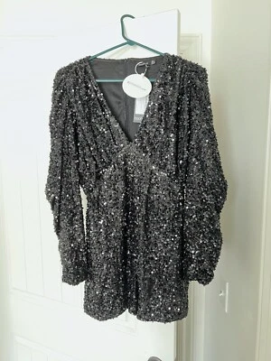 Mameluco de lentejuelas negro talla 6 Foto 1 de 3