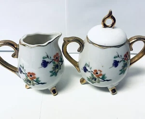 Fiori di ciliegio vintage a forma di uovo crema e zucchero - Foto 1 di 8