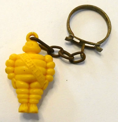 1960'S MICHELIN TIRES BIBENDUM MAN YELLOW VINTAGE KEYCHAIN KEY RING - Image 1 of 4