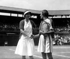 Mrs, Helen Wills-Moody of the USA, being congratulated by Old Photo