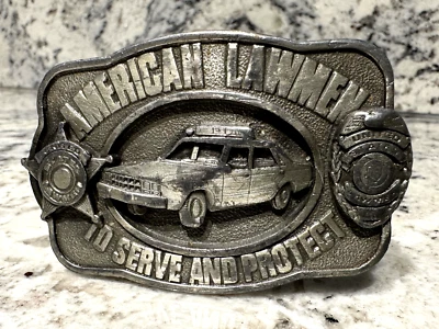 American Lawmen Para Servir y Proteger Coche de Policía Siskiyou M-27 1983 Hebilla de Cinturón Foto 1 de 4