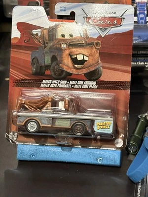 Disney Pixar Cars Mater With Sign Radiator Springs Racing Team New  - Image 1 of 2