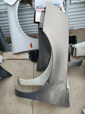 Guardabarros izquierdo Cadillac DTS 2006 2007 2008 2009 2010 2011 DORADO Foto 1 de 2