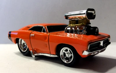 MUSCLE MACHINES 1969 DODGE CHARGER R/T  1/64 69 CHARGER  - ORANGE - Image 1 of 4