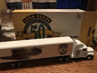 Remolque tractor Freightliner ERTL JD JOHN DEERE 50 AÑOS ESCALA 1/64 NUEVO EN CAJA LQQK Foto 1 de 3
