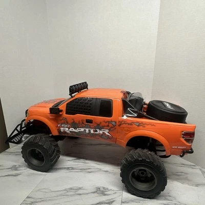 New Bright Orange Ford Raptor RC Truck w Remote For Parts - Image 1 of 4
