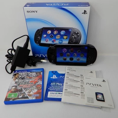 Sony PlayStation PS Vita PCH-1002 Console WiFi OLED Handheld Boxed + 2 Games AUS - image 1 of 4