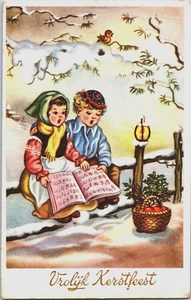 Merry Christmas Boy and Girl Singing in the Snow Vintage Postcard B133 - Picture 1 of 2