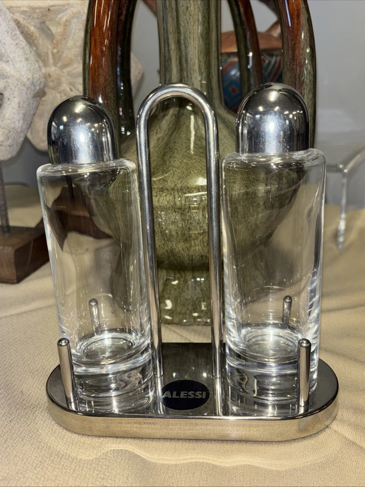Juego de galletas dispensadoras de aceite y vinagre cromado vidrio Alessi Inox 18/10 hecho en Italia Foto 1 de 4