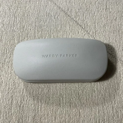 Estuche rígido para gafas Warby Parker blanco gris con tela usado ver descripción Foto 1 de 4