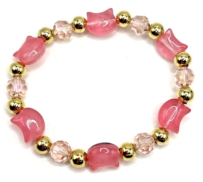 Adorable brazalete elástico de acero inoxidable dorado con cuentas de vidrio rosa de 7" Foto 1 de 4