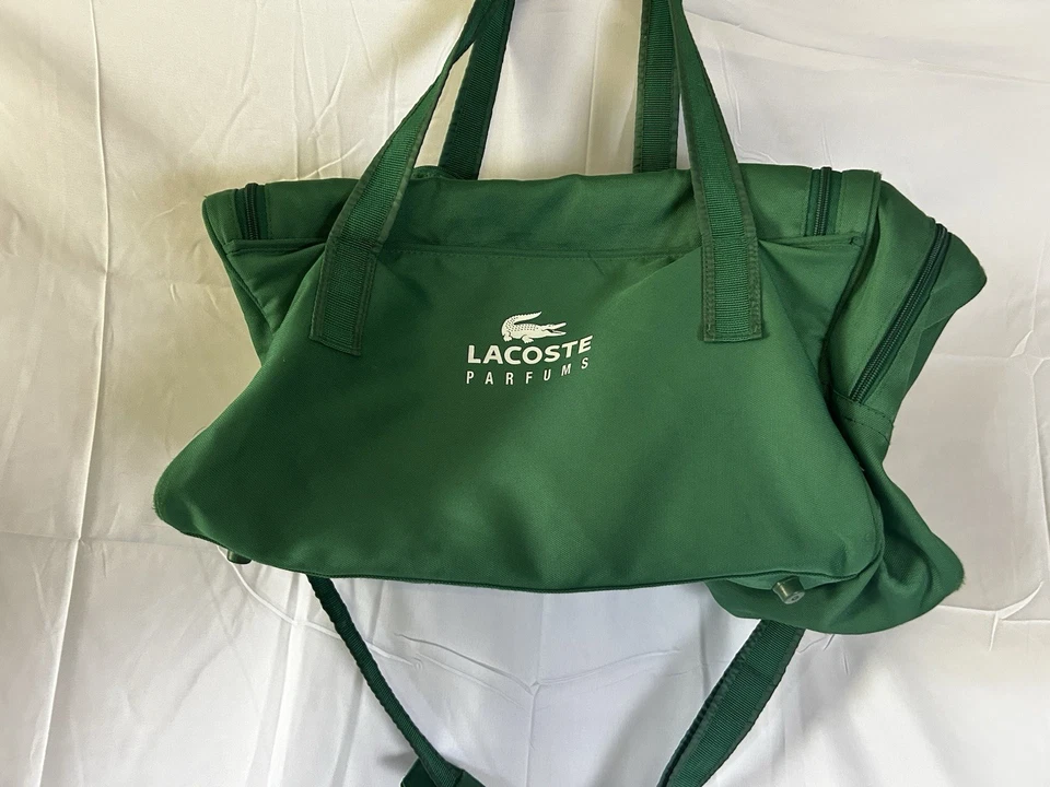  Vintage LACOSTE Parfums Promotional Duffle Bag Shoulder Strap Green 20x11x10  - Image 1 of 4