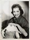 1934 Press Photo Actress Frances Drake with beaded bag in Hollywood, California