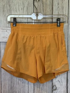 Pantalones Cortos Lululemon Hotty Hot Forrados de tiro bajo 2.5" Naranja Atletismo Atlético W 4 - Imagen 1 de 6