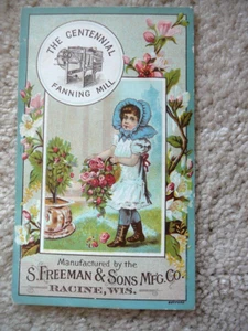 Freeman & Sons Centennial Fanning Mill Antique Trade Card Girl & Basket of Roses - Bild 1 von 2
