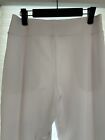 Womens white stretch Size L polyester yoga like pants with pockets never worn