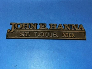 John E. Hanna St. Louis MO concesionario de automóviles emblema insignia logotipo nombre - Imagen 1 de 6