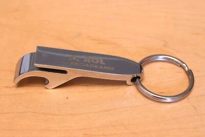 Редкий винтажный рекламный хромированный открывалка для бутылок 1990-х годов «AOL для широкополосной связи», изящный - Изображение 1 из 4