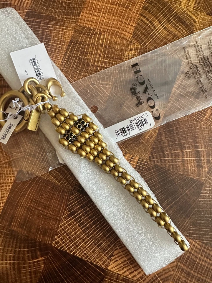 NUEVO CON ETIQUETAS COACH Bolso Serpiente Cuentas Año Nuevo Lunar Dije CZ127 Foto 1 de 4