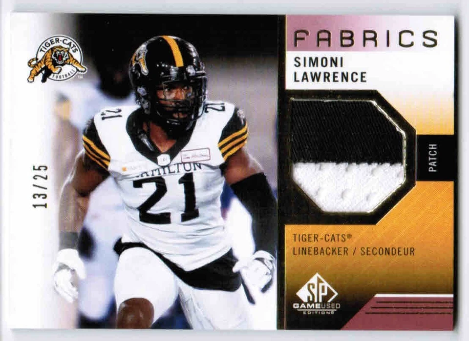 2021 SP GAME USED CFL SIMONI LAWRENCE SL FABRICS PATCH /25 HAMILTON TIGER-CATS - Image 1 of 1