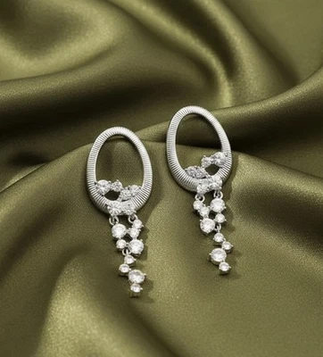 Pendientes de aro Anthropologie circonita cúbica acanalados plateados ovalados boho de colección tachuelas declaración cascada Foto 1 de 4