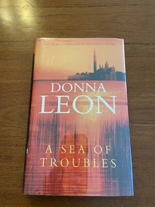 SIGNED A Sea of Troubles By Donna Leon 1st UK Printing 1st UK Edition 2001 HCDJ - Picture 1 of 12