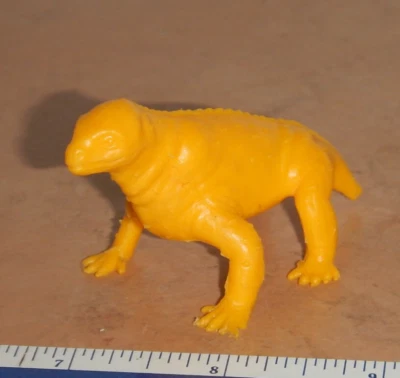 ORIGINAL 1960s NABISCO MPC  DIONSAUR - YELLOW MOSCHOPS - CEREAL PREMIUM - Image 1 of 3