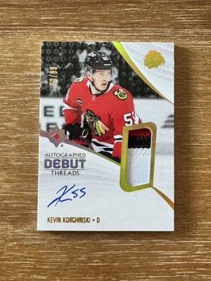 2023-24 ULTIMATE COLLECTION KEVIN KORCHINSKI #52/99 AUTO DEBUT THREADS RPA 3 CLR - Image 1 of 2