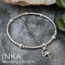 Inka Sterling Silver bead and noodle Stacking Bracelet with a Dragonfly charm