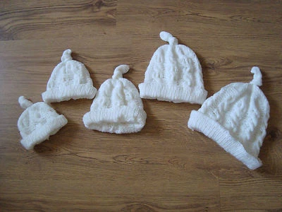 HAND KNITTED BY SELLER Hand Knitted Cabled top knot baby childs hat * White with shimmer * 5 sizes